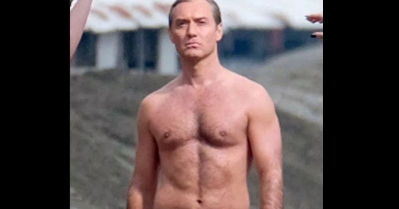Jude Law stuns in tiny white speedo as he takes a dip at Venice beach during filming of 'The New Pope'