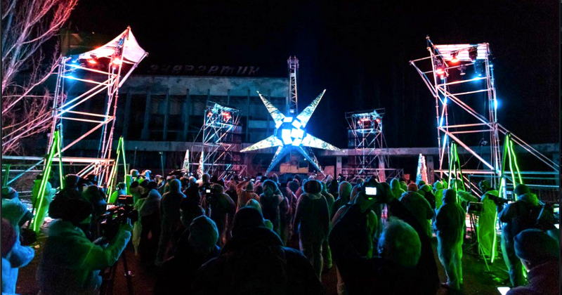 Chernobyl is now a tourist attraction as rave partygoers throng the ruins in gas masks and nuclear fallout suits