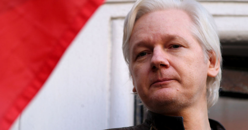 What are the potential charges against Julian Assange following his arrest in London?