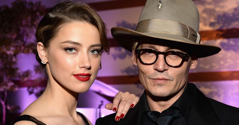 Amber Heard says Johnny Depp threw a phone at her face, and yanked her hair in 2016 deposition video