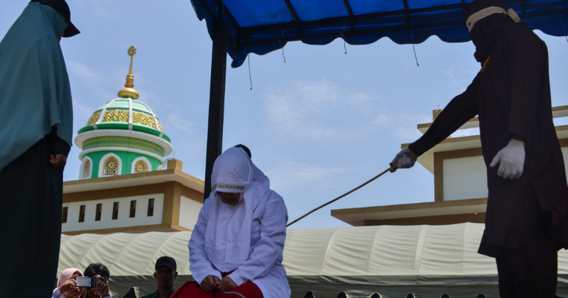 Indonesian woman publicly flogged for breaking Sharia law by having sex outside of wedlock