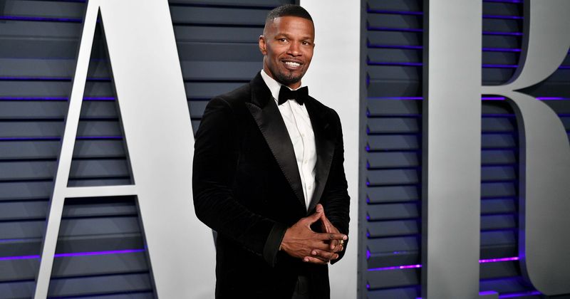 Katie Holmes and beau Jamie Foxx look happier than ever walking hand in hand in New York