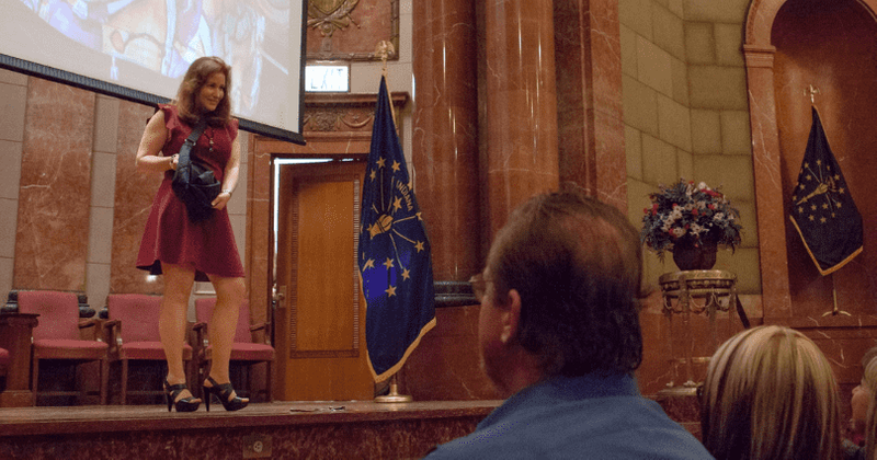 Women show off 'carrywear' at NRA's Concealed Carry fashion show with concealed weapon slots in bags and undergarments
