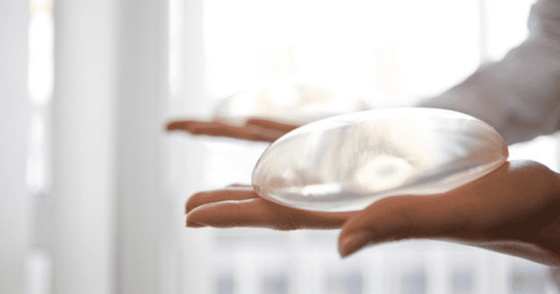Breast implants linked to rare cancer will stay in market, but with bolder warnings, announces FDA
