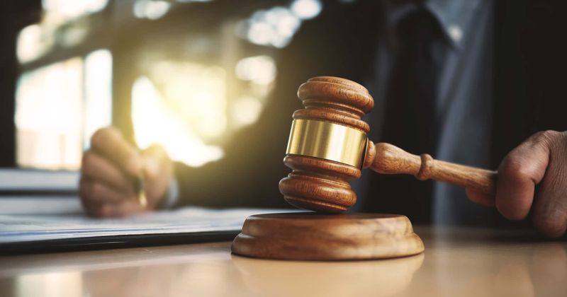 Two men from Texas wrongfully convicted of stabbing a man to death declared innocent after 19 years