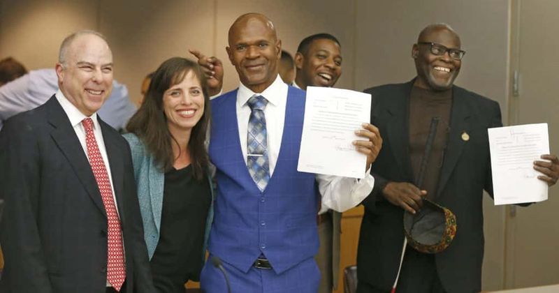 Two men from Texas wrongfully convicted of stabbing a man to death declared innocent after 19 years