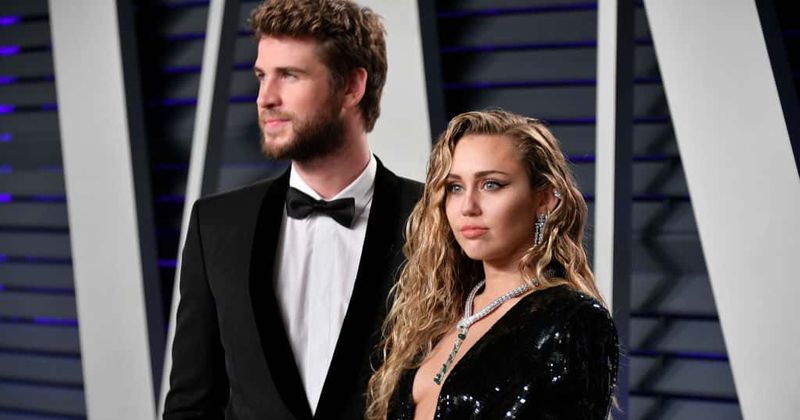 Miley Cyrus gets groped by a 'fan' while in Barcelona with husband Liam Hemsworth