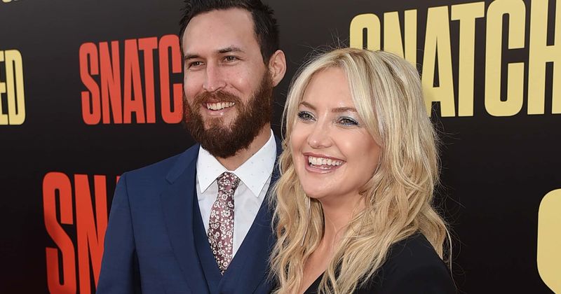 Kate Hudson announces she's pregnant with her third child, a baby girl, amid confetti and balloons