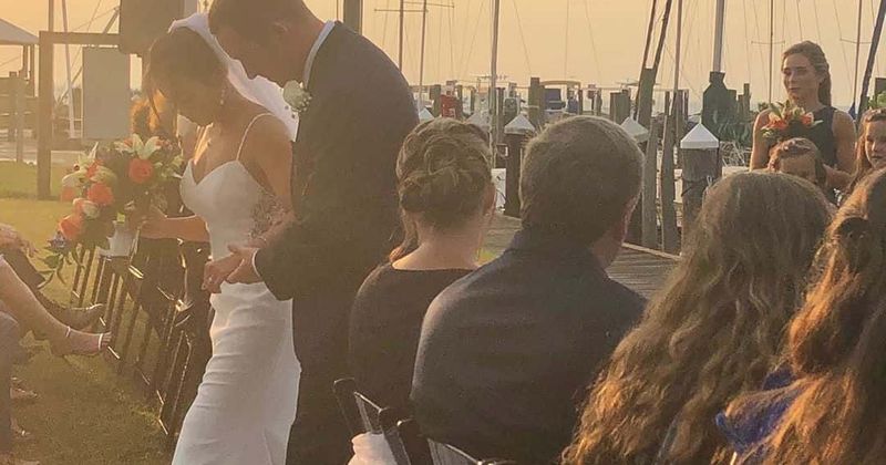 Gymnast who dislocated both knees in career-ending fall fulfils her wedding wish by walking down the aisle on her legs