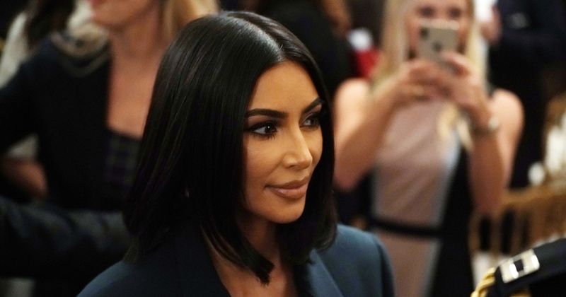 Kim Kardashian slammed for White House picture of her lounging on a table: 'Classy on the table just like TRUMP LIKES IT'