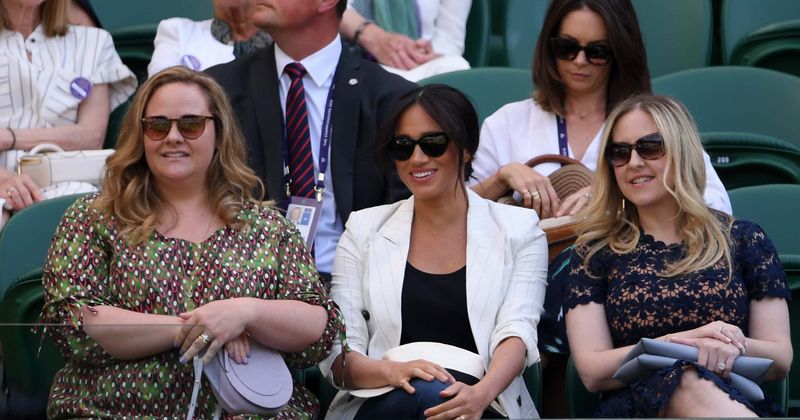 Tennis fans ordered not to take pictures of Meghan Markle at Wimbledon as she was there 'in a private capacity'