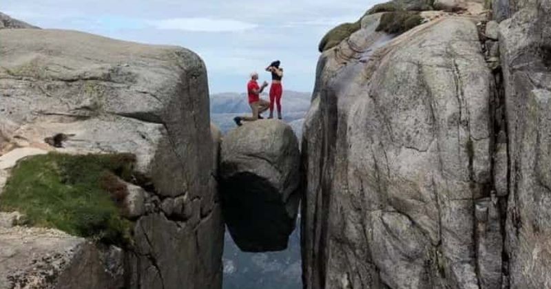 She said Yes! Man proposes to girlfriend atop 3000ft high boulder wedged between two cliffs in Kjeragbolten, Norway