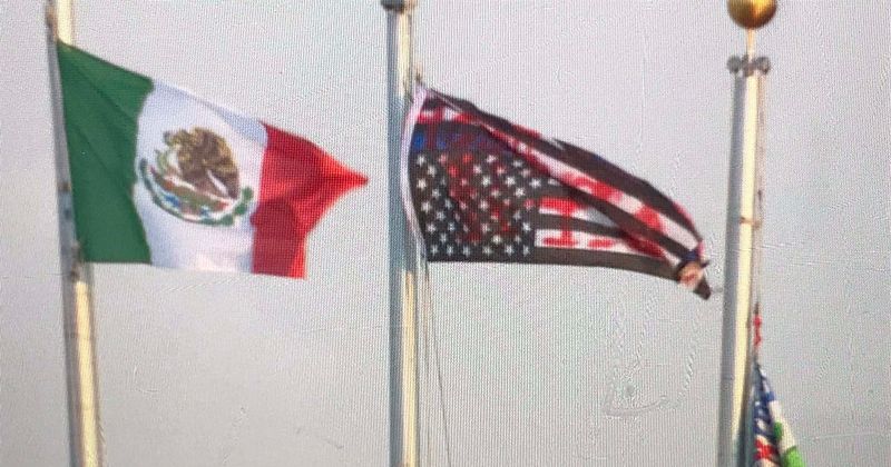 Anti-ICE protestors replace US flag with Mexican flag, vandalize 'Blue Lives Matter' flag outside detention facility