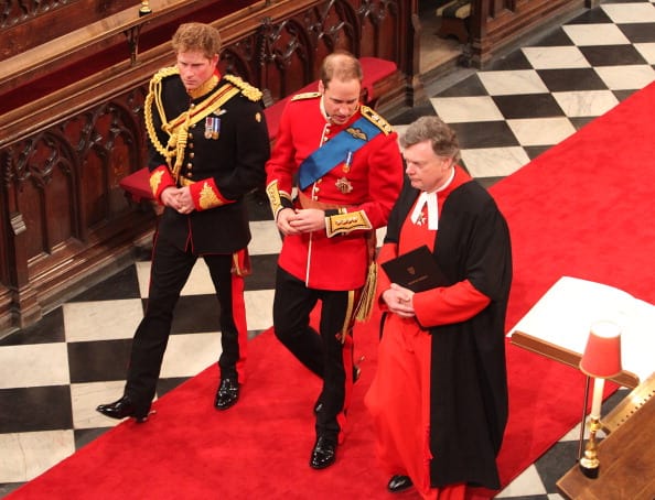 Prince William (centre) and his best man Prince Harry (left) are greeted by Receiver General Stephen Lamport (right) as they arrive inside Westminster Abbey ahead of the Royal Wedding of Prince William to Catherine Middleton at Westminster Abbey on April 29, 2011 in London, England. The marriage of the second in line to the British throne is to be led by the Archbishop of Canterbury and will be attended by 1900 guests, including foreign Royal family members and heads of state. Thousands of well-wishers from around the world have also flocked to London to witness the spectacle and pageantry of the Royal Wedding. (Photo by Anthony Devlin - WPA Pool/Getty Images)