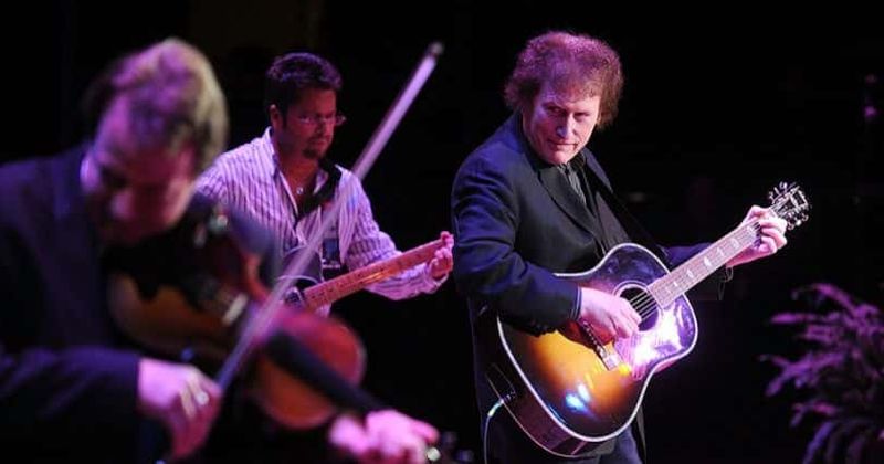 Grammy-winning country musician Randy Scruggs dies at 64