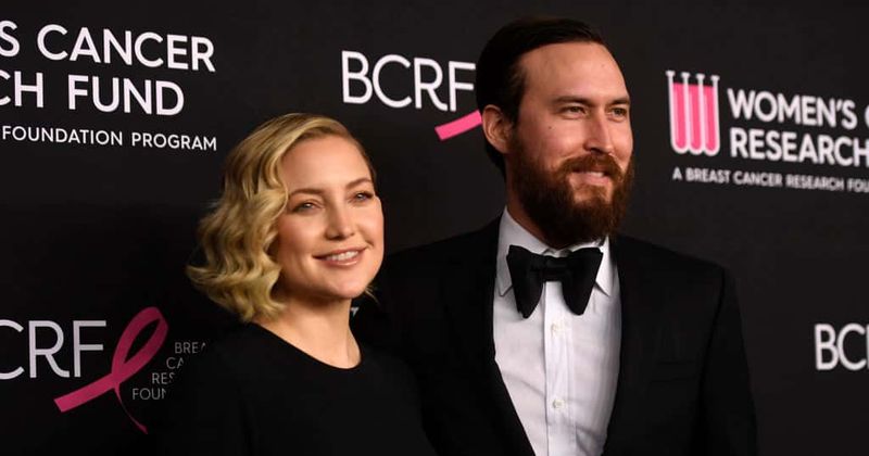 Pregnant Kate Hudson rocks her baby bump in an itsy bitsy red bikini