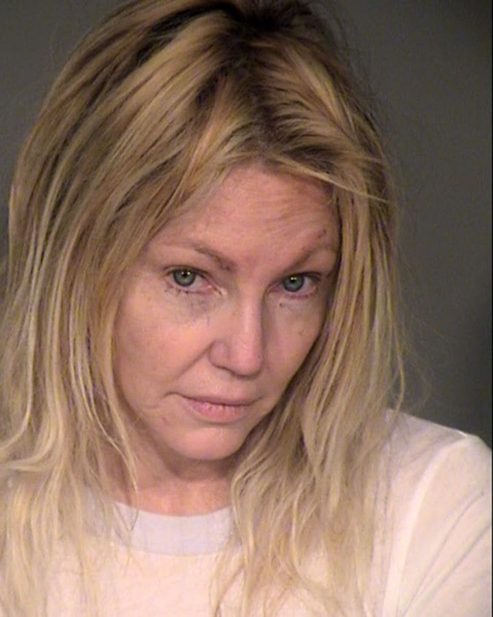 In this handout photo provided by the Ventura County Sheriffs Office, actress Heather Locklear is seen in a police booking photo after her arrest on charges of suspicion of domestic battery and assaulting a peace officer February 25, 2018 in Ventura, California. Police were called to Locklears Thousand Oaks home after reports of a domestic battery. Locklear was released after posting bail. (Photo by Ventura County Sheriffs Office via Getty Images)