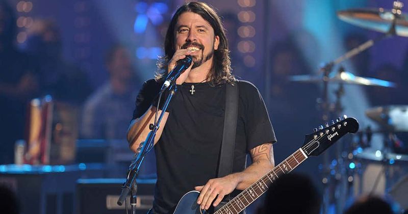 Dave Grohl 'adopts' a fan during a gig, says 'I'll be your daddy'