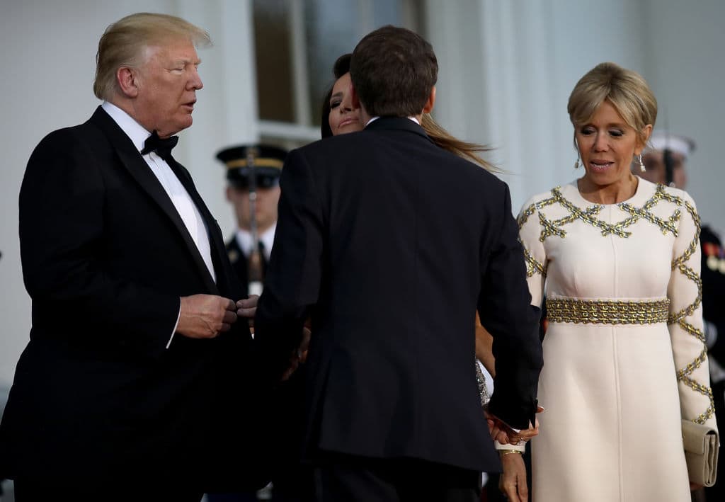U.S. President Donald Trump and first lady Melania Trump welcome French President Emmanuel Macron and his wife Brigitte to the White for a state diner April 24, 2018 in Washington, DC. (Photo by Win McNamee/Getty Images)