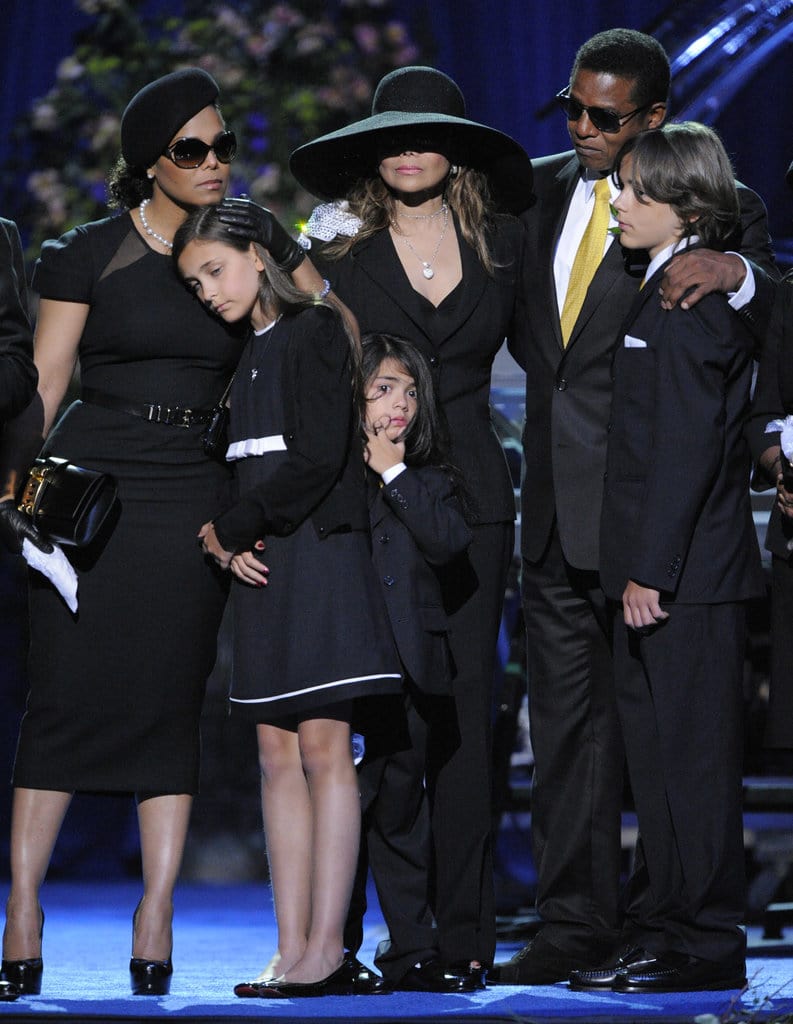 Janet Jackson, Paris-Michael Katherine, LaToya Jackson, Jermaine Jackson and Prince Michael Jackson II (also known as Blanket) attend the Michael Jackson public memorial service held at Staples Center on July 7, 2009 in Los Angeles, California. (Photo by Gabriel Bouys-Pool/Getty Images)