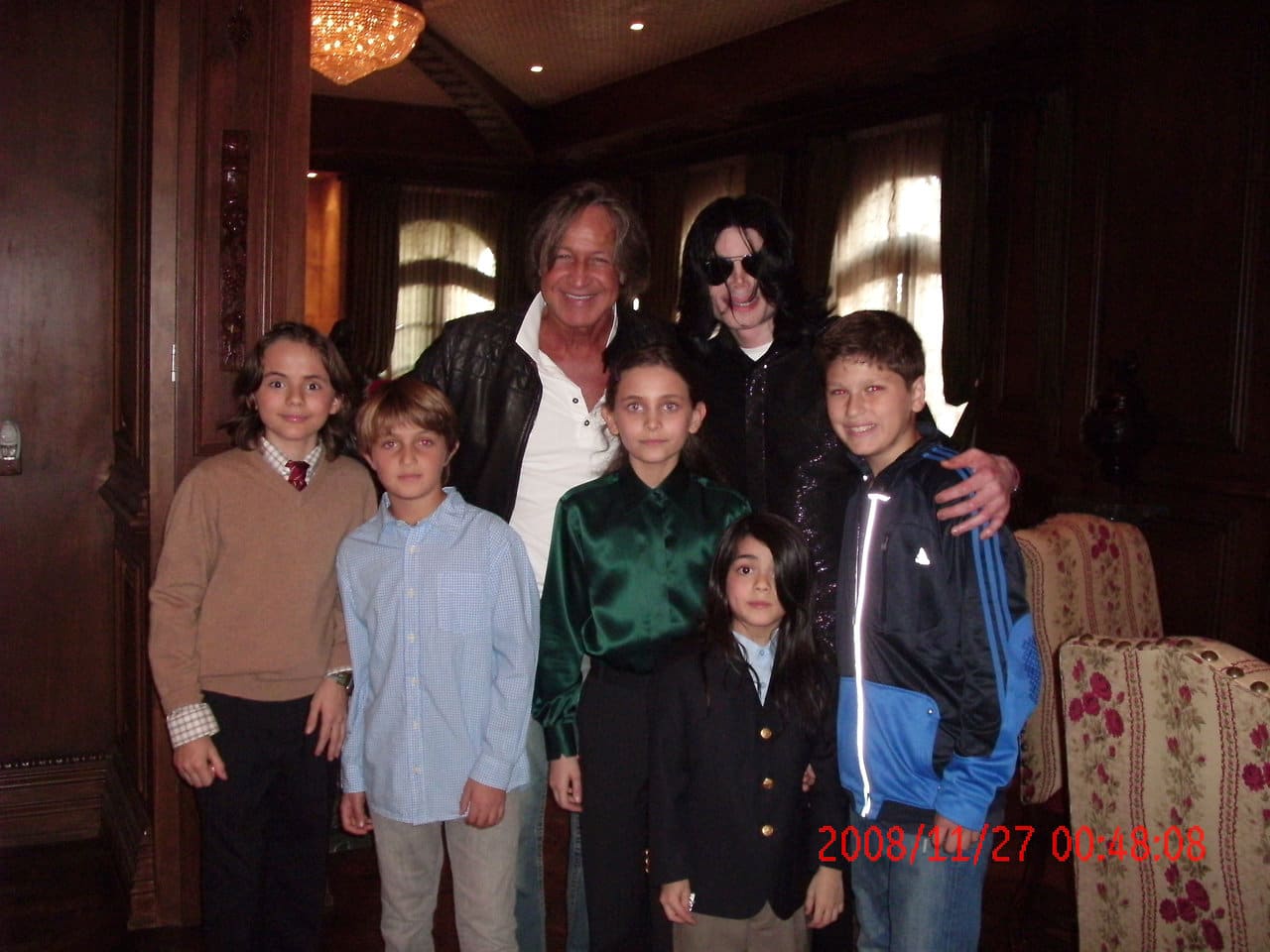 Michael Jackson (3rd R) poses with real estate developer Mohamed Hadid (3rd L), Hadid's children and Jackson's children Michael Joseph Jr. (L), Paris Michael Katherine (C) and Prince Michael II (2nd R) on November 27, 2008 at the Jackson Holmby Hills residence in Westwood, California. (Photo by Mohamed Hadid via Getty Images)