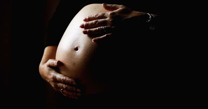 Pregnant woman who was shot outside her house stayed on life support and delivered her son before dying