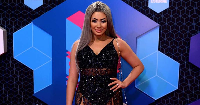 Geordie Shore’s Chloe Ferry reveals her bandaged face days after nose surgery and boob job