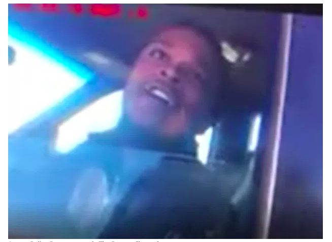 A screenshot of the video shows Jordan Hancock talking back to the officer from his car. (YouTube)