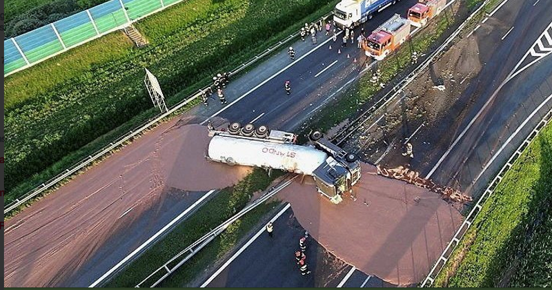 Tons of melted chocolate spilled onto highway in Poland after truck overturns, all traffic comes to a halt