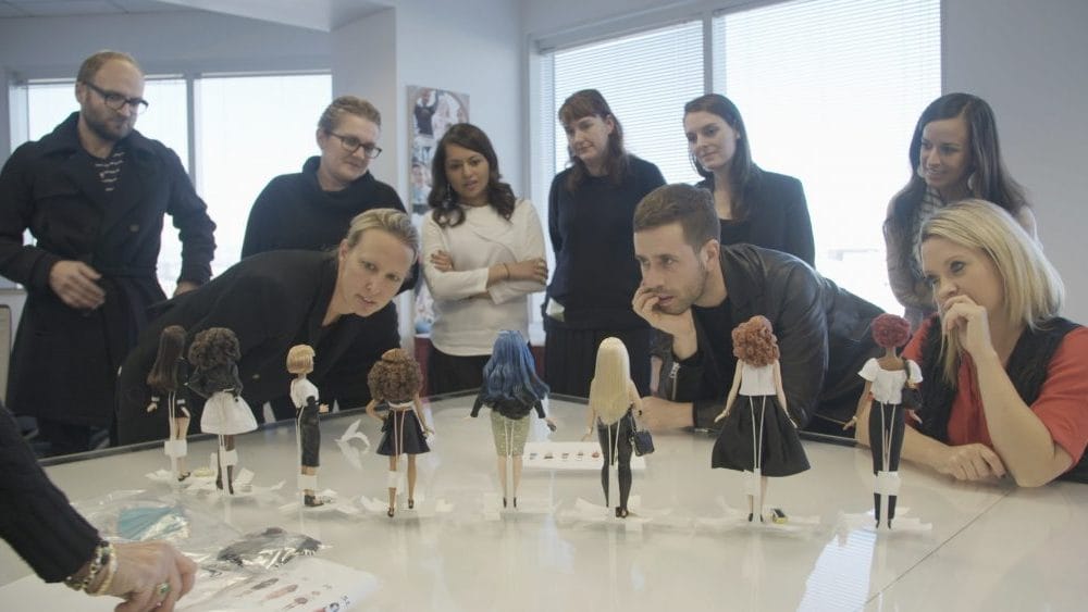 Still from the documentary on Mattel team having a look at Project Dawn Barbies