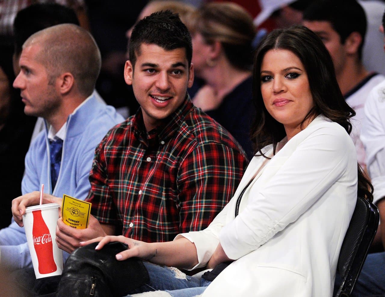 Khloe Kardashian wife of Los Angeles Lakers Lamar Odom #7 and her brother Rob Kardashian follow the action during the NBA basketball game against Atlanta Hawks at Staples Center on November 1, 2009 in Los Angeles, California. (Photo by Kevork Djansezian/Getty Images)