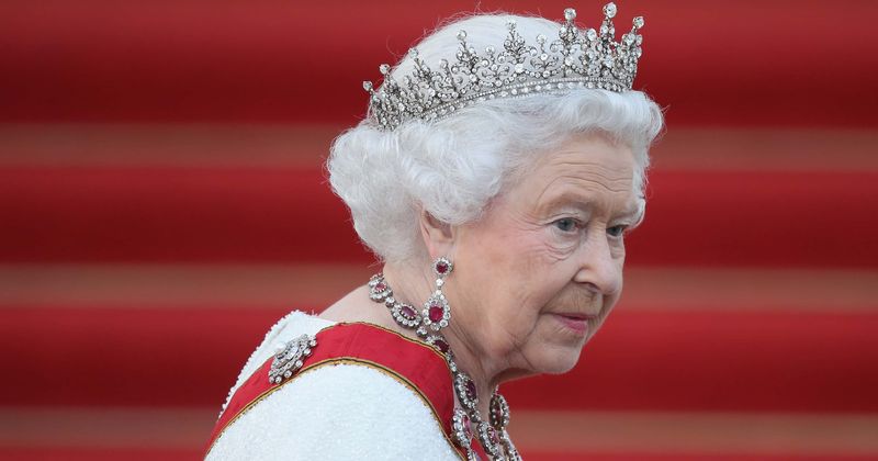 Queen Elizabeth is reportedly furious with Meghan Markle's dad over staged paparazzi shots