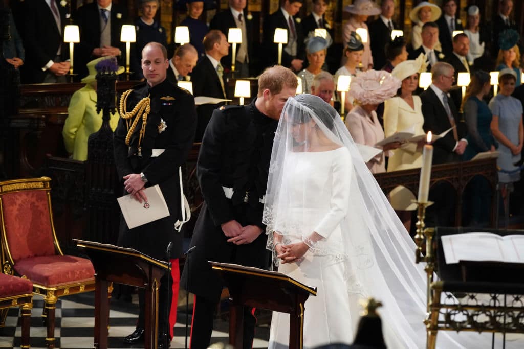 The open bateau neckline showed off Markle's shoulders and the beautiful fit at the waist emphasizes on her petite figure(Getty Images)