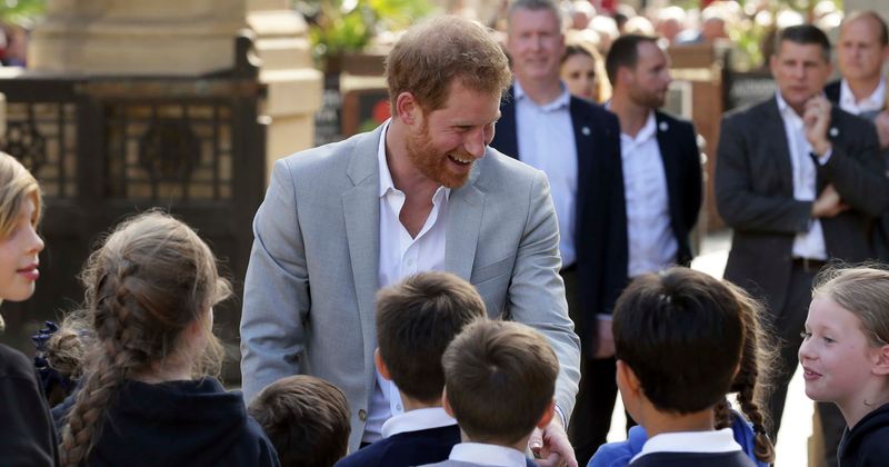 HARRY'S HEART OF GOLD: Prince Harry met an orphan boy in Africa 14 years ago, guess where he was over the weekend