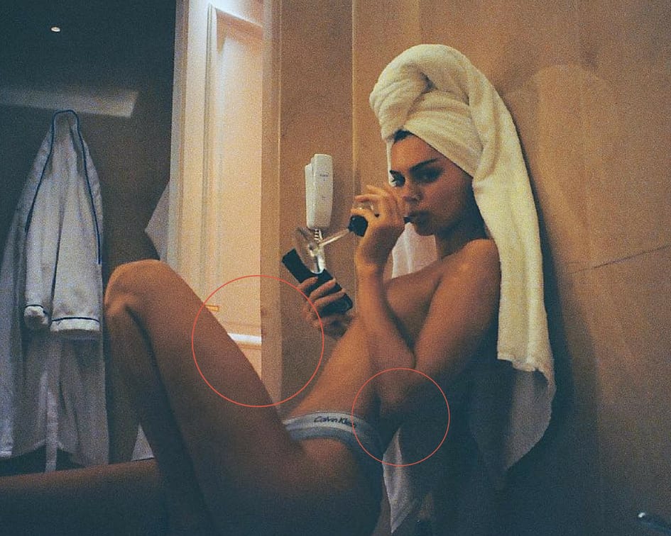 The photograph shows a slightly distorted wall in the background while Kendall's stomach seems to be cinched in (Source: Instagram)