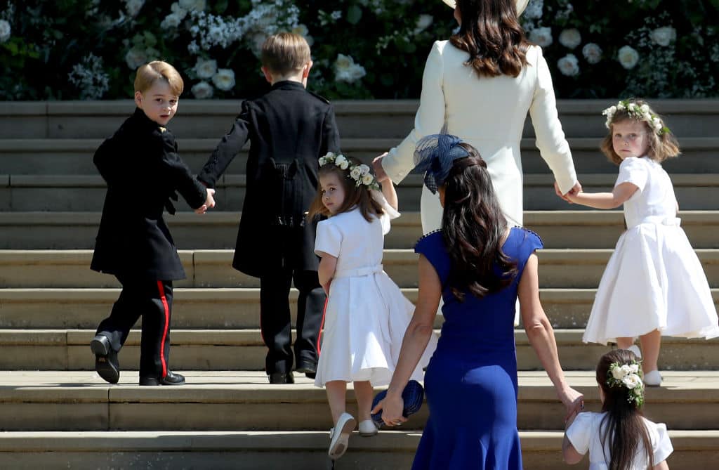 Prince George of Cambridge, Jasper Dyer, Princess Charlotte of Cambridge, Catherine, Duchess of Cambridge, Jessica Mulroney, Ivy Mulroney and Florence van Cutsem arrive at the wedding of Prince Harry and Ms Meghan Markle at St George's Chapel at Windsor Castle on May 19, 2018 in Windsor, England (Photo by Jane Barlow - WPA Pool/Getty Images)