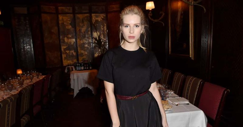 Model Lottie Moss bares her beautiful skin in a revealing sideless dress in Ibiza