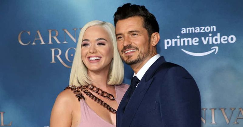 Orlando Bloom prances around in his birthday suit as Katy Perry applauds from the audience