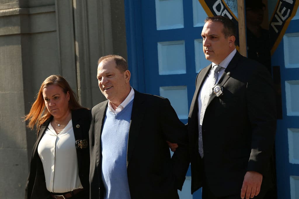Harvey Weinstein is led out of the New York Police Department's First Precinct in handcuffs after being arrested and processed on charges of rape, committing a criminal sex act, sexual abuse and sexual misconduct on May 25, 2018 in New York City. The former movie producer faces charges in connection with accusations made by aspiring actress Lucia Evans who has said that Weinstein forced her to perform oral sex on him in his Manhattan office in 2004. Weinstein (66) has been accused by dozens of other women of forcing them into sexual acts using both pressure and threats. The revelations of the his behavior helped to spawn the global #MeToo movement. (Photo by Spencer Platt/Getty Images)