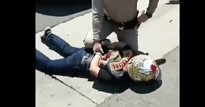 Shocking clip shows cop hitting motorcyclist with his patrol car to knock him off and arrest him