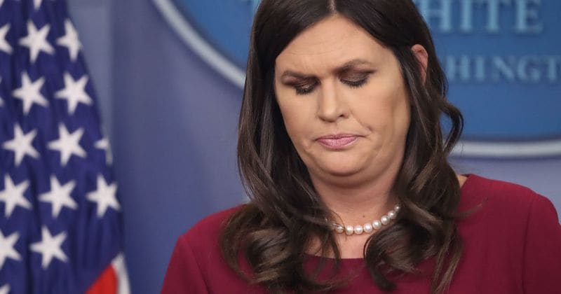 Sarah Huckabee Sanders chokes up when a child asks her about school shootings