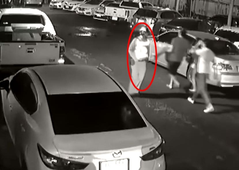 The group walked right past a security guard with the unconscious woman (YouTube)