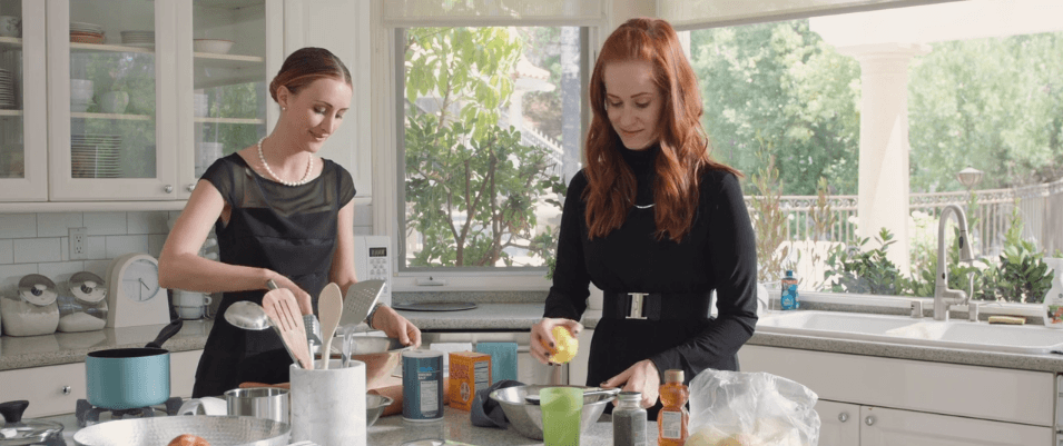 The two sisters in the process of baking the lemon and poppy seed madeleins for their mother's Shiva.