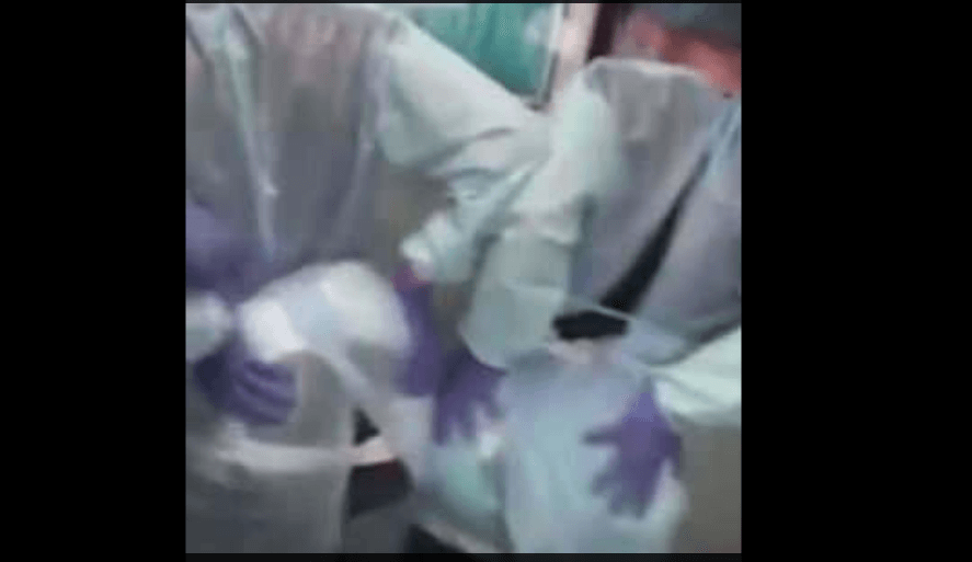 Dr. Boutte's assistants dancing and grabbing their butts during a surgical procedure. (YouTube/screenshot)
