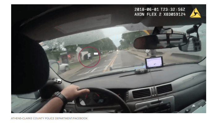 A screengrab of the officer driving behind the suspect. (Facebook)