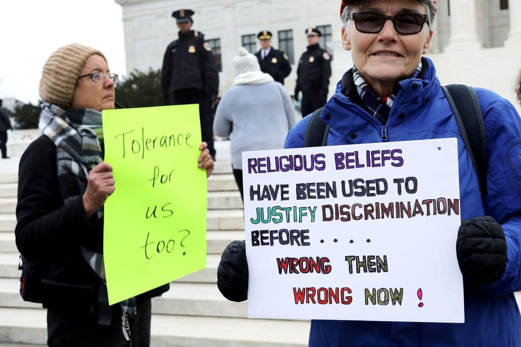 Protesters on both sides of the issue rally in front of the Supreme Court building on the day the court is to hear the case Masterpiece Cakeshop v. Colorado Civil Rights Commission December 5, 2017 in Washington, DC. (Getty Images)