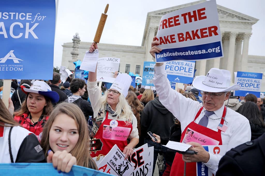 Demonstrators rally in front of the Supreme Court building on the day the court is to hear the case Masterpiece Cakeshop v. Colorado Civil Rights Commission December 5, 2017 in Washington, DC. (Getty Images)