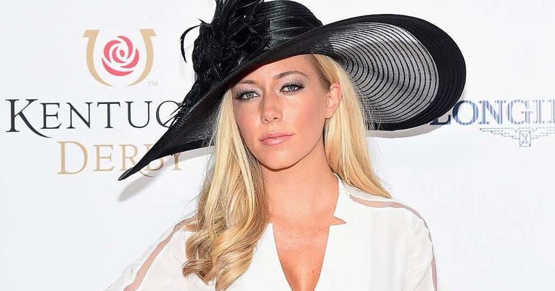 Kendra Wilkinson is struggling to convince herself that she is happy without Hank