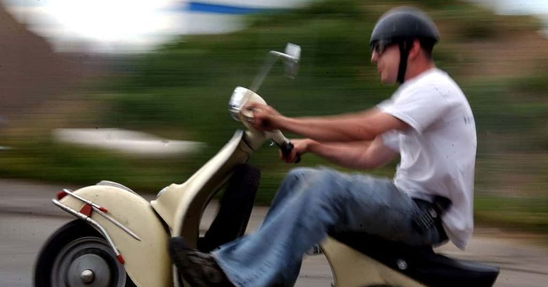Moped muggers strike again! Woman fighting for life after being punched by thugs on wheels