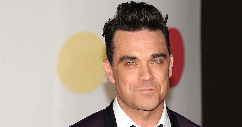 Robbie Williams evacuated to safety after massive fire breaks out in London's Mandarin Oriental hotel days after multi-million-dollar renovation